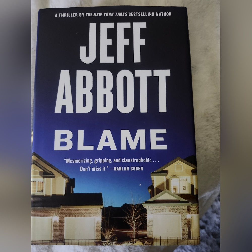 'Blame' Hardcover Book